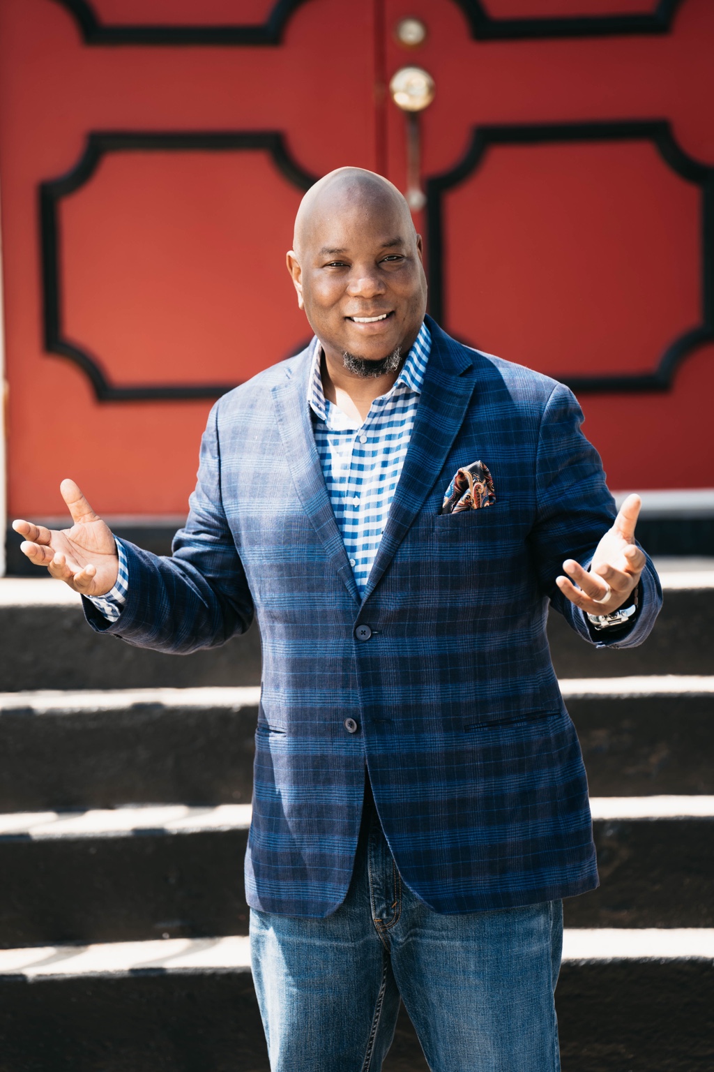 Pastor Sean standing and smiling